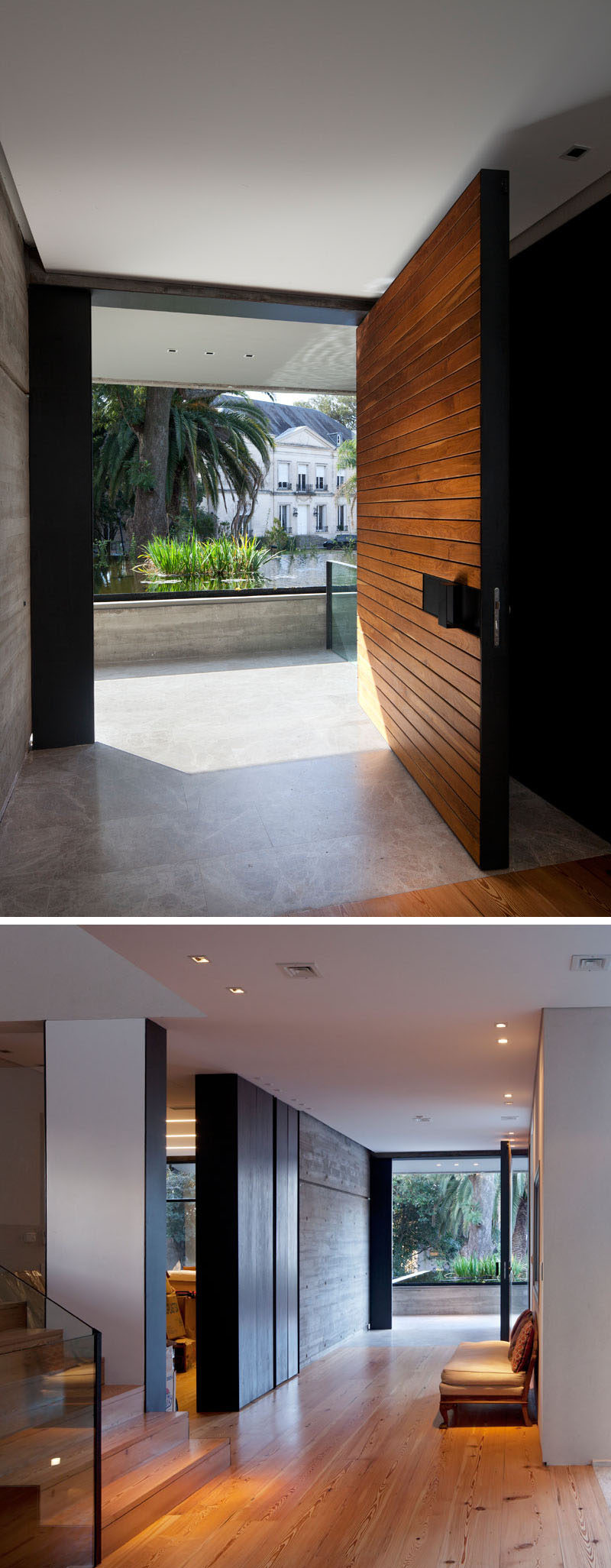 A large pivoting wood front door welcomes you to this modern concrete house, and a foyer provides access to the various levels of the house. #PivotingDoor #WoodFrontDoor #ModernWoodDoor #Foyer