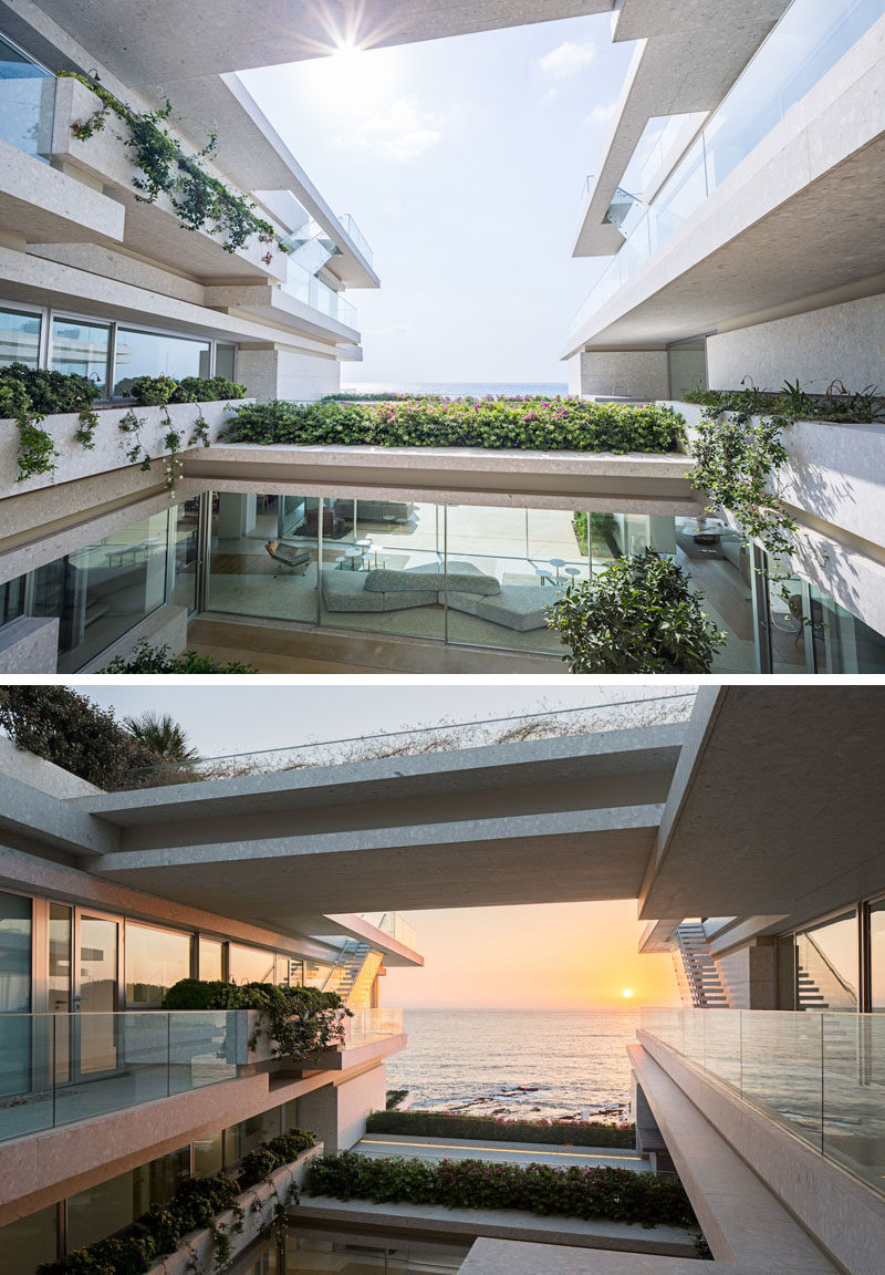 The design of this modern beach house has a central staircase that's open and as it travels down to a common reception area, it provides picture perfect views of the sea and shows off the many plants on display. #Architecture #ModernHouse