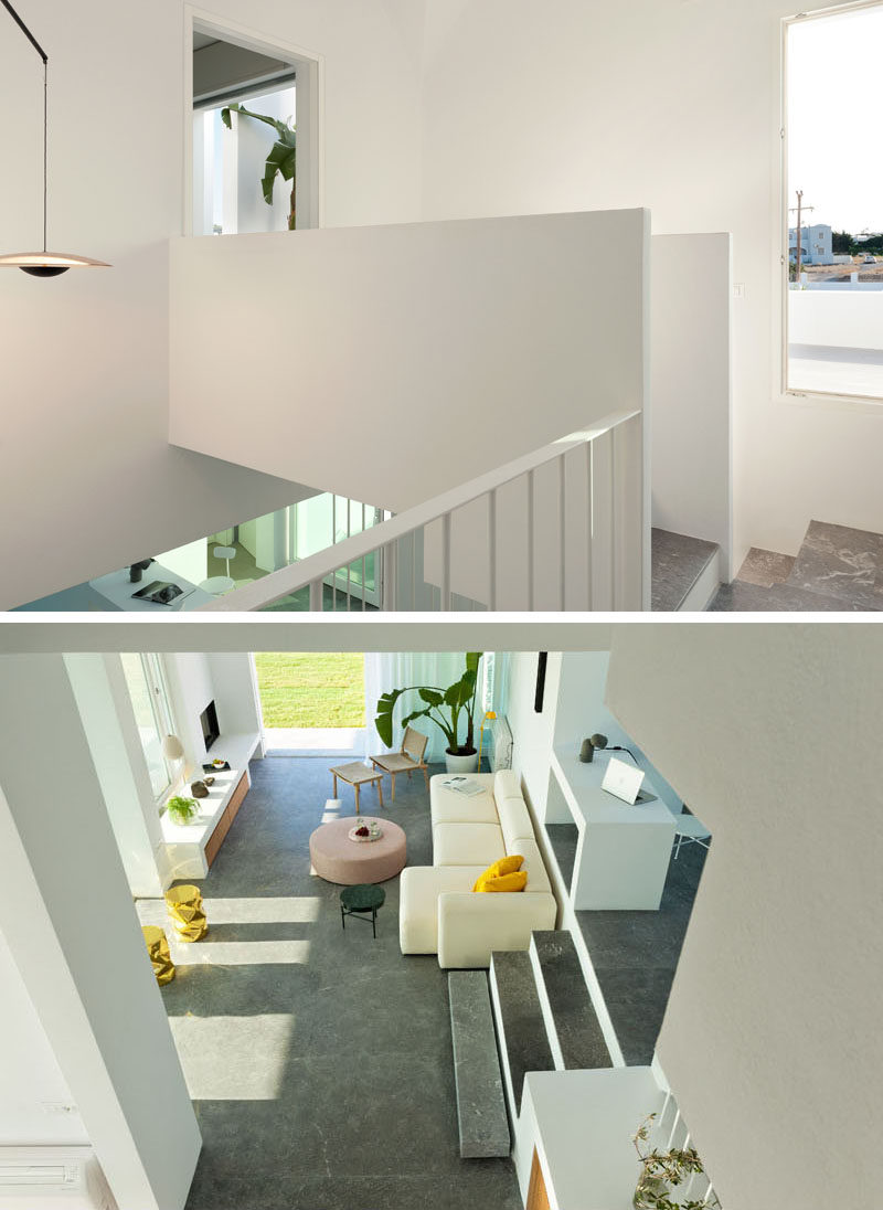 These modern white stairs provide a view of the living room from above and a small bridge connects to the master bedroom. #Architecture #InteriorDesign