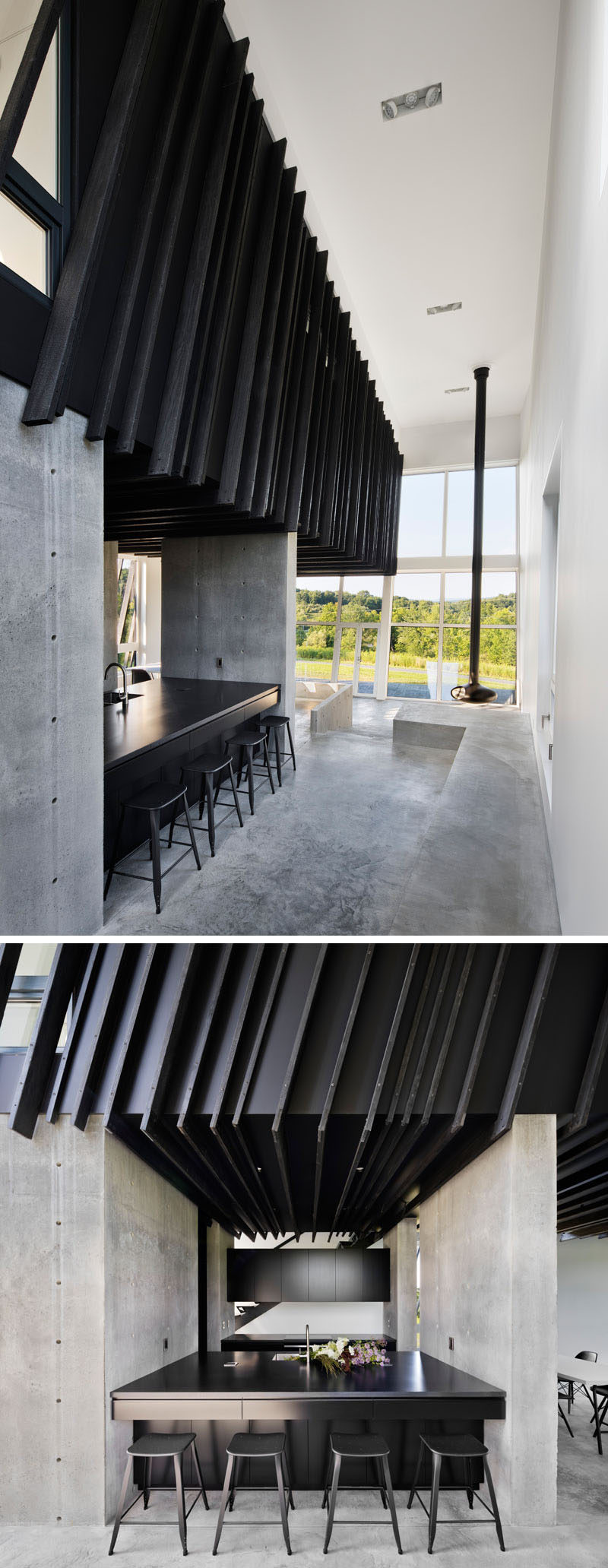 Inside this modern house, which was designed as a weekend escape from the city, the Shou Sugi Ban siding continues and creates a strong contrast to the white walls and polished concrete flooring. In the kitchen, minimalist black cabinets and countertops compliment the other black details in the interior. #ShouSugiBan #ModernHouseInterior #ConcreteFlooring #BlackKitchen