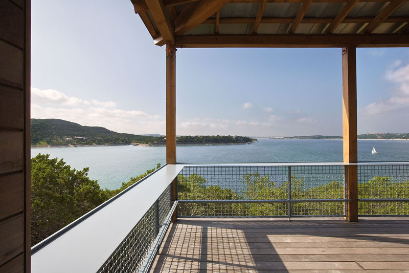 This tower has a shaded terrace that sits 30 feet above the ground and has views of the trees and lake. #Terrace #Architecture