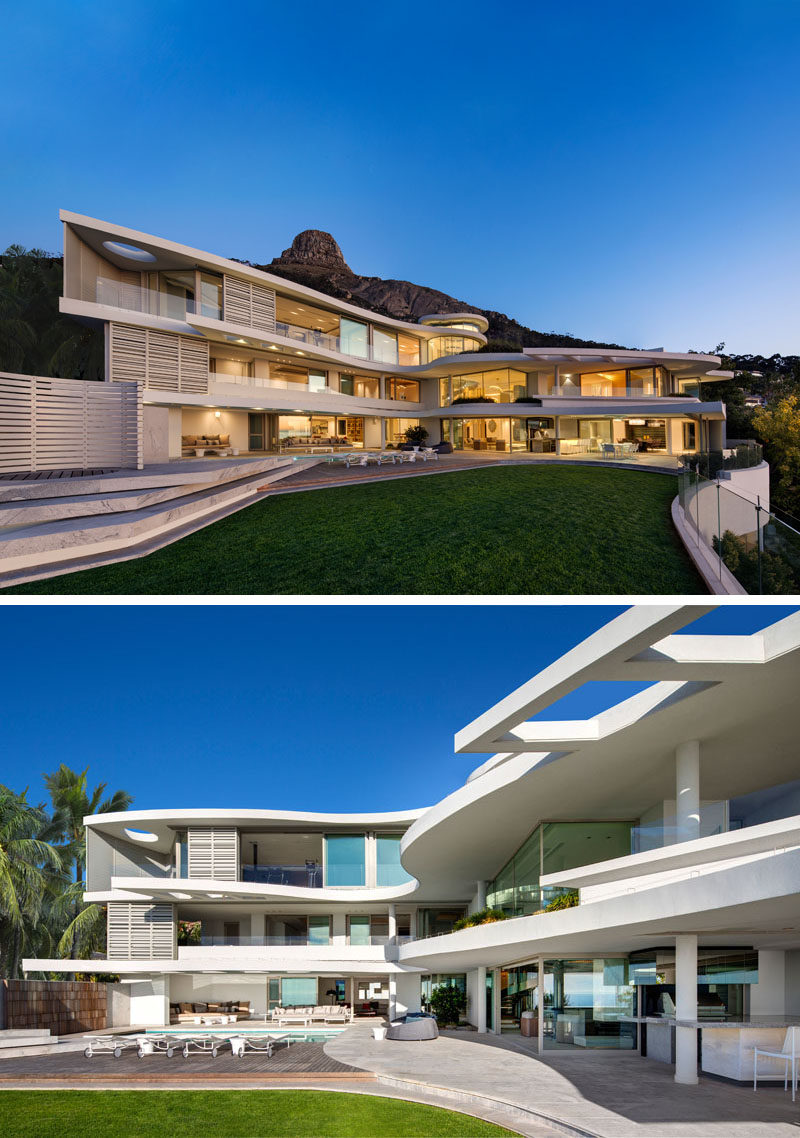 This modern house has three storeys and a large outdoor entertaining area with a landscaped yard and swimming pool. #ModernHouse #ModernArchitecture #HouseDesign