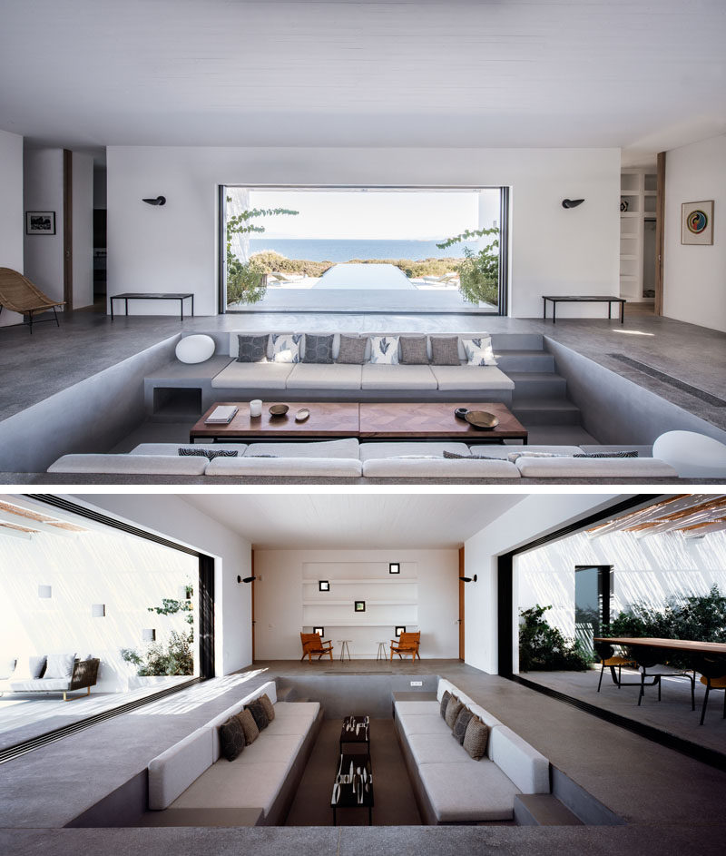 This modern summer house in Greece has a sunken living room with built-in furniture, that allows for uninterrupted views throughout the house. #SunkenLivingRoom #LivingRoom #InteriorDesign #ModernHouse