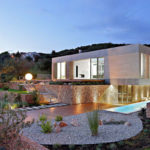 This Island House Has A Large Landscaped Terraced Garden And An Atrium With A Single Olive Tree