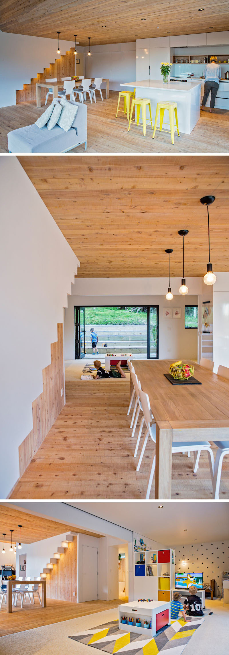 In this modern house, minimalist white kitchen cabinets and dining chairs compliment the white walls. Next to the dining room is a sliding wall that opens to reveal the children's open plan shared bedroom and play area. #ModernInteriorDesign #Kitchen #WhiteKitchen #KidsRoom