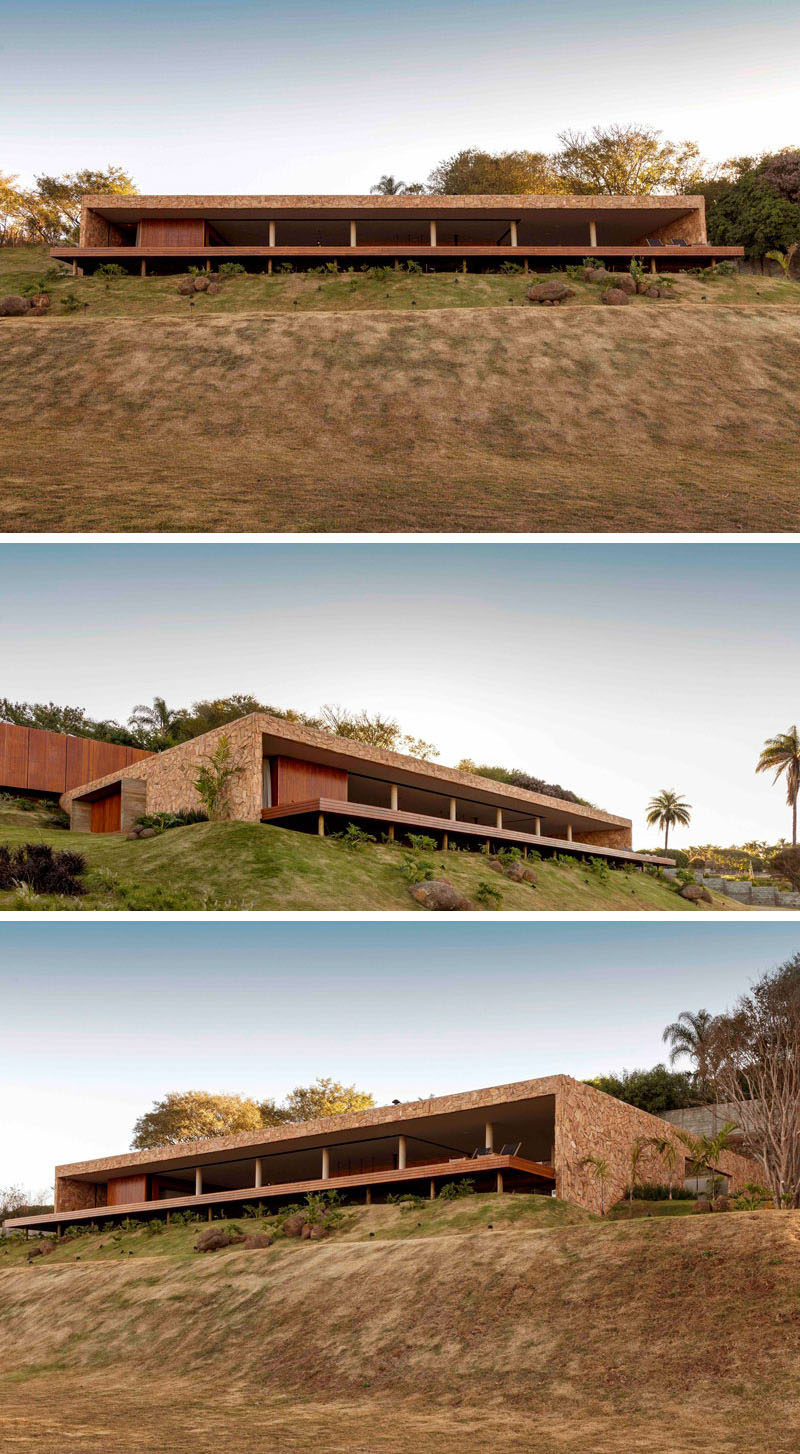 This modern house is split into two 'boxes', with the lower building designated for the social areas, and the upper building for sleeping. #ModernHouse #ModernArchitecture #HouseDesign #Brazil