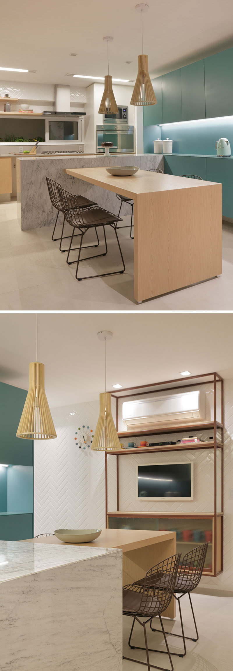 In this modern kitchen, marble has been combined with light wood pendant lights and a wood eat-in dining table. On the wall, light blue kitchen cabinets add a soft pop of color and on the other wall, white subway tiles have been used for a backsplash that reaches all the way to the ceiling. #ModernKitchen #KitchenDesign #InteriorDesign #Kitchen