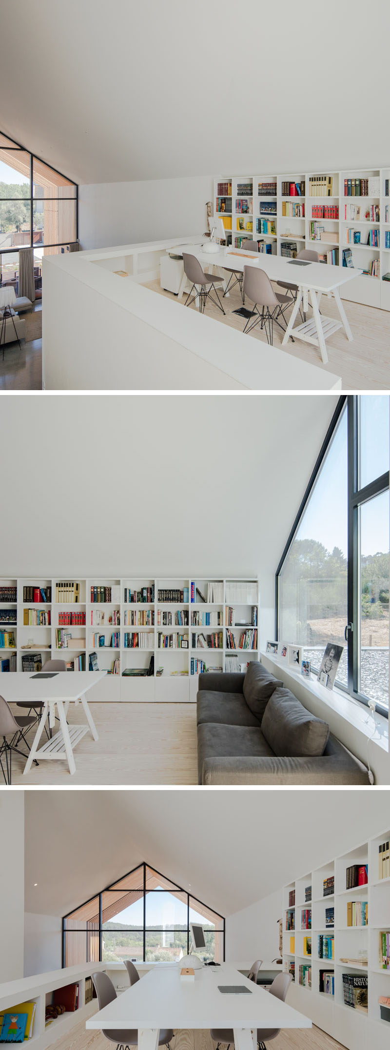 This loft area has been set up as a library / home office. A shelving unit runs along the wall and acts as a bookshelf and storage unit. A large white table provides space for four people to work at and underneath the window is a couch for relaxed reading. #ModernLibrary #HomeOffice #Shelving
