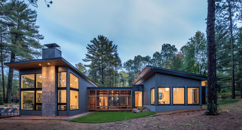 Strand Design have recently completed a new modern, vacation lake home in northern Minnesota, for a young couple that combines their appreciation of Scandinavian architecture and their active lifestyle, and at the same time, celebrates the natural woods environment. #ModernHouse #HouseDesign #ModernArchitecture