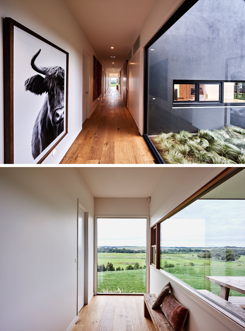 Large windows, where possible, add natural light to this modern hallway that features American Oak flooring. #WoodFlooring #Hallway #Windows