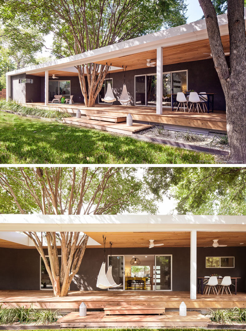 At the rear of this modern home, a back porch was added that runs the entire length of the house. The porch canopy has a cut-out to allow the existing crepe myrtle tree to stay in its original location. #Porch #ModernPorch #OutdoorSpace