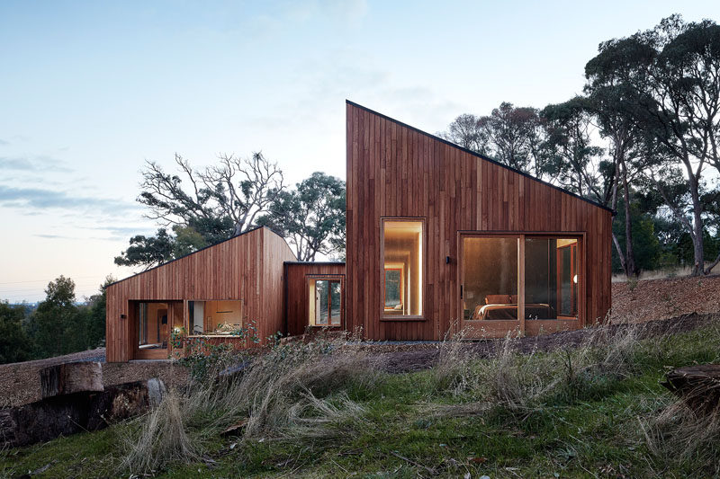Moloney Architects have recently completed a new modern wood home in Invermay, Australia, that's named the 'Two Halves House', as the house is split with the social areas in one half and the sleeping areas in the other. #ModernHouse #ModernArchitecture