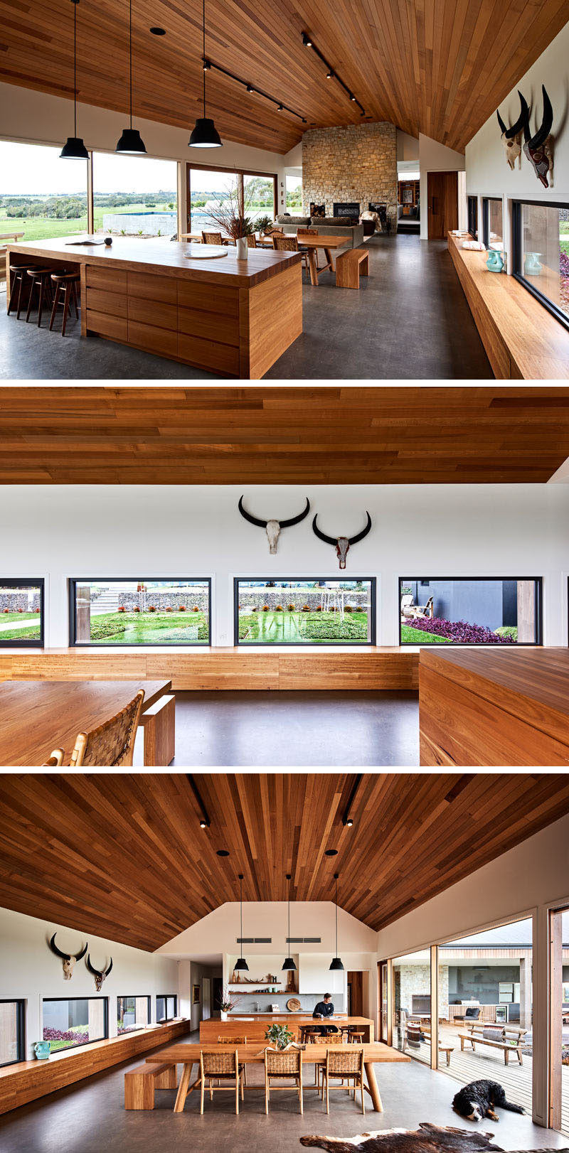 Inside this modern ranch-inspired house, the main living area is open with a Cedar lined cathedral ceiling and due to the position of the house, large picture windows provide 180 degrees of views of the surrounding land. #InteriorDesign #CathedralCeiling #Windows