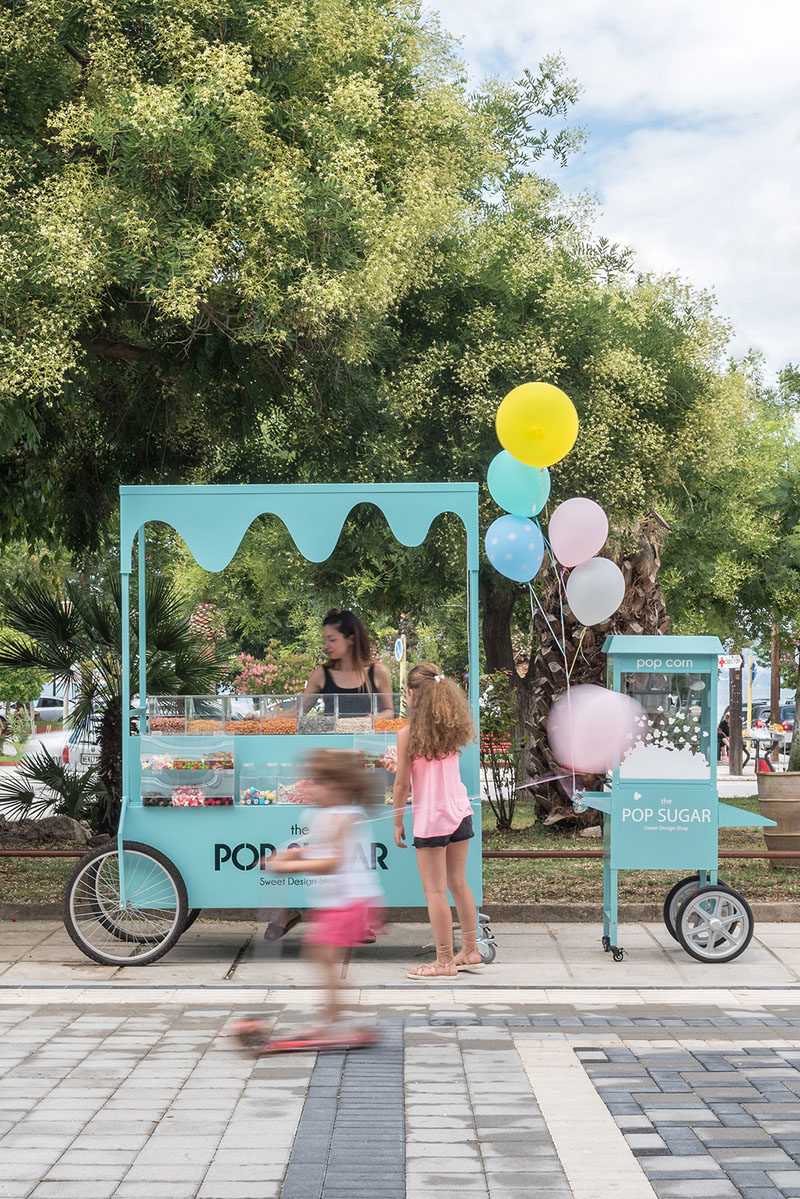 This small modern street cart sells sweets and popcorn. #StreetCart #Design