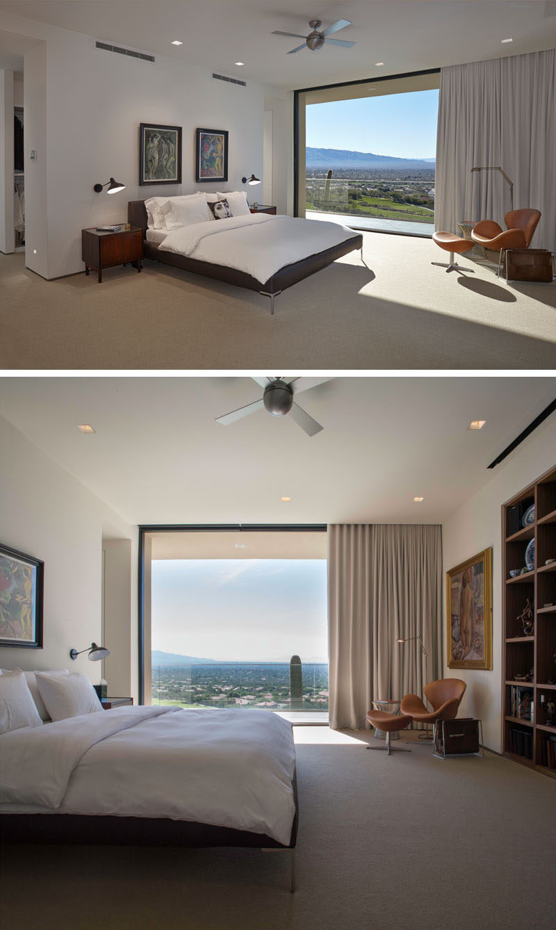 In this modern bedroom, a large floor-to-ceiling sliding glass wall can open to give the bedroom access to a private balcony. #GlassWall #ModernBedroom