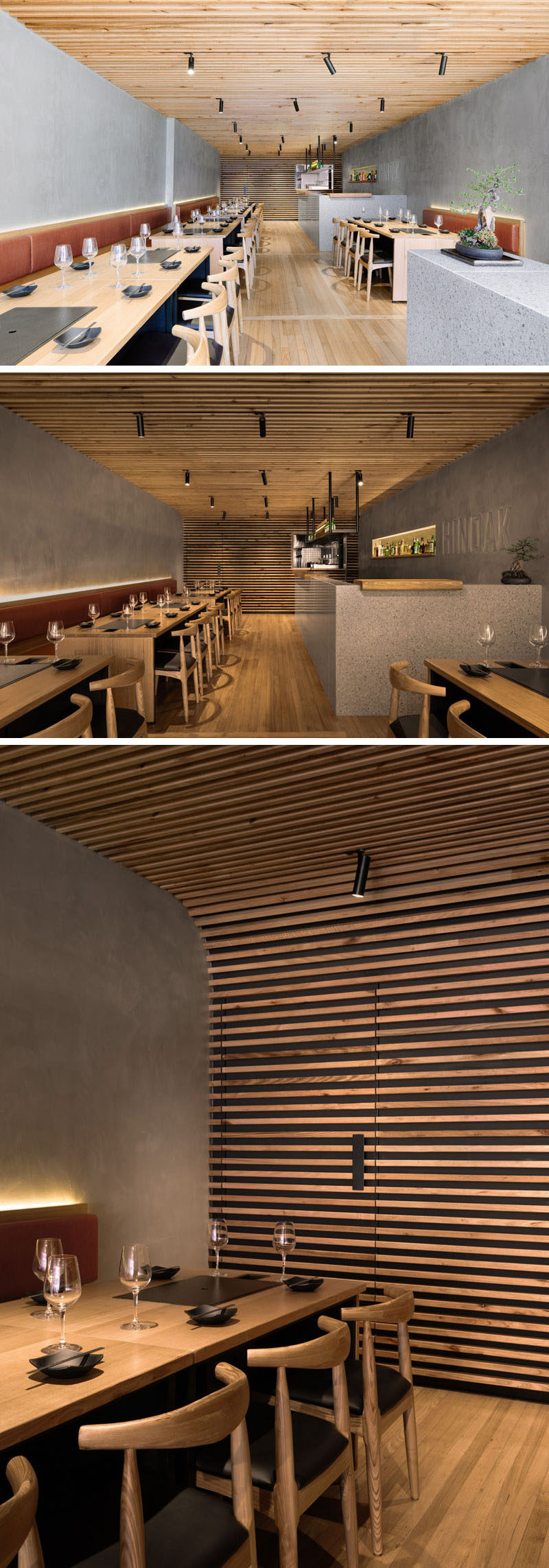 Inside this modern restaurant, the ceiling reflects elements of the finely crafted eaves of traditional Korean houses. The timber-battened ceiling descends gently from the front of the restaurant to the back, and at the end it curves into the rear wall and hides the door. #RestaurantDesign #InteriorDesign #Restaurant