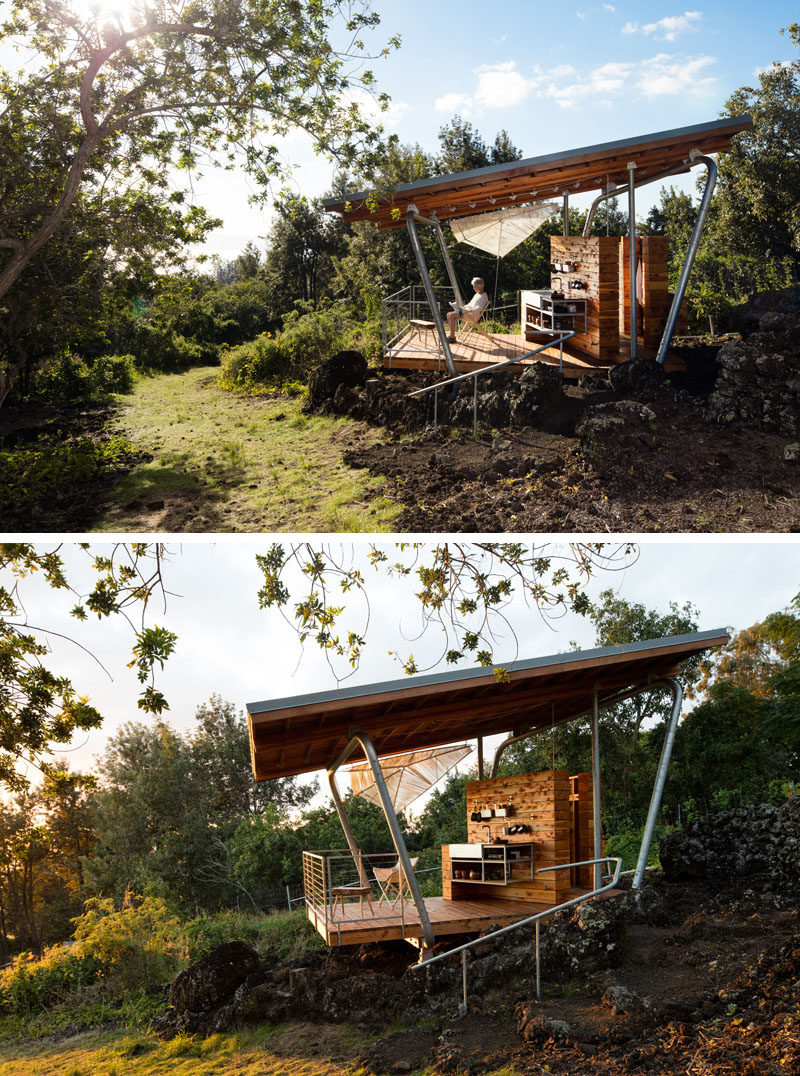 This modern outdoor pavilion has sloped roof, deck, a kitchen and an outdoor shower. #Architecture #Pavilion #OutdoorSpace