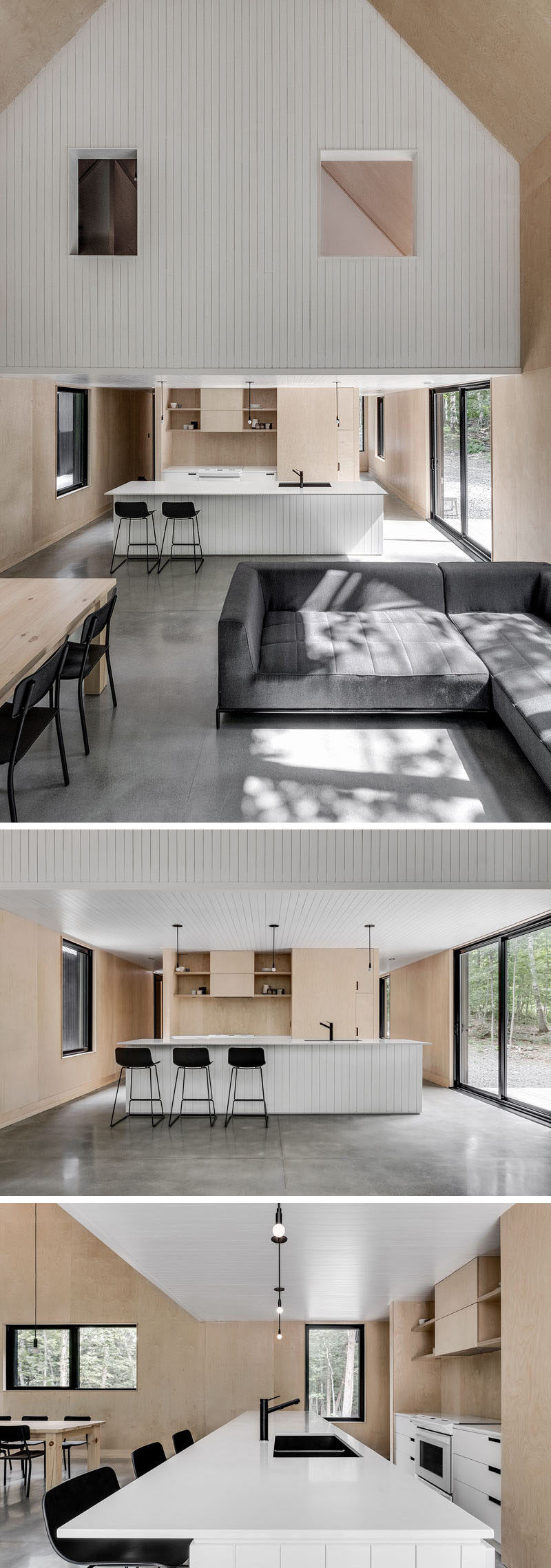 Inside this modern cottage, a high vaulted ceiling creates a sense of openness, while the kitchen is located behind the dining room and living room, and underneath the upper floor of the home. #VaultedCeiling #KitchenDesign #WhiteAndWoodKitchen