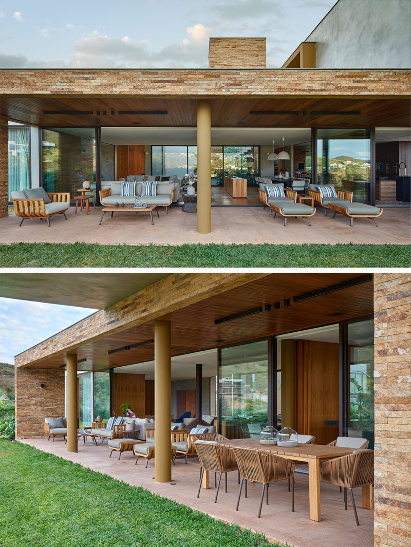 The living areas of this modern house all open up to a covered outdoor entertaining area with various seating options and an alfresco dining area. #OutdoorEntertaining #OutdoorDining