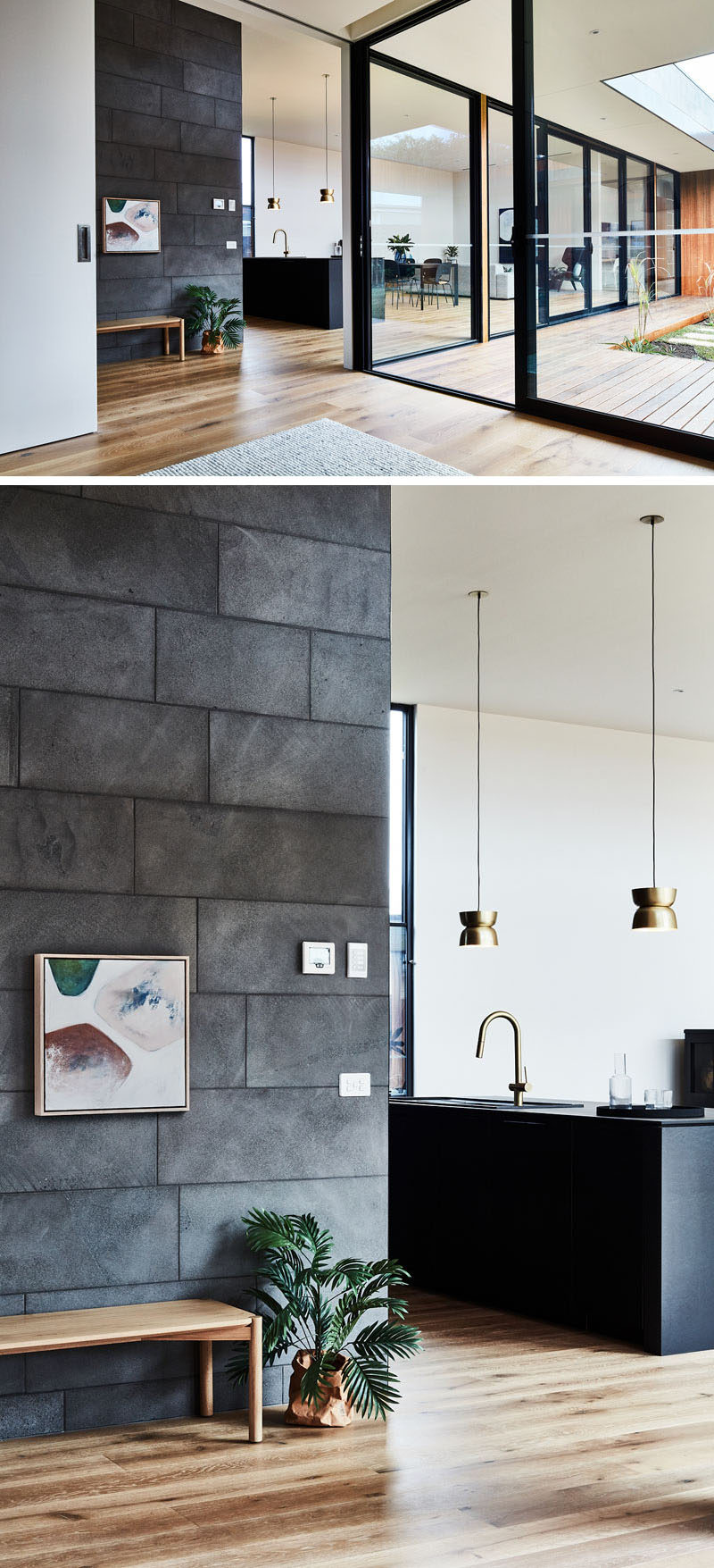 Stepping into this modern house, you become aware that the house wraps around an internal courtyard, while oak flooring adds a warm touch to the stone and black elements. #ModernHouse #InteriorDesign