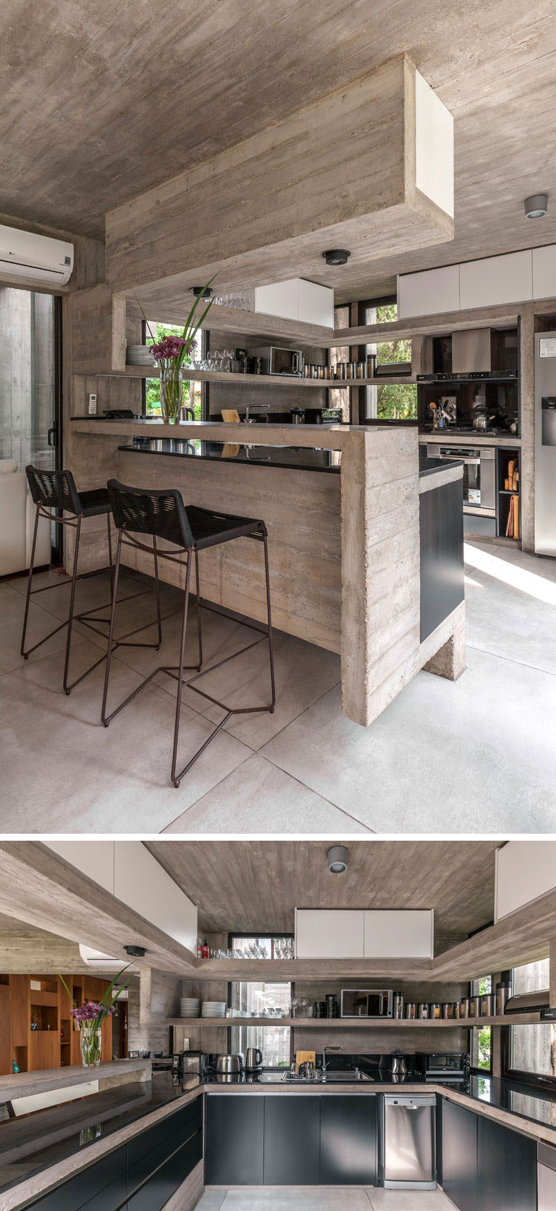 In this kitchen, black cabinets and countertops have been combined with concrete shelving to create a modern appearance. #ConcreteKitchen #BlackCabinets