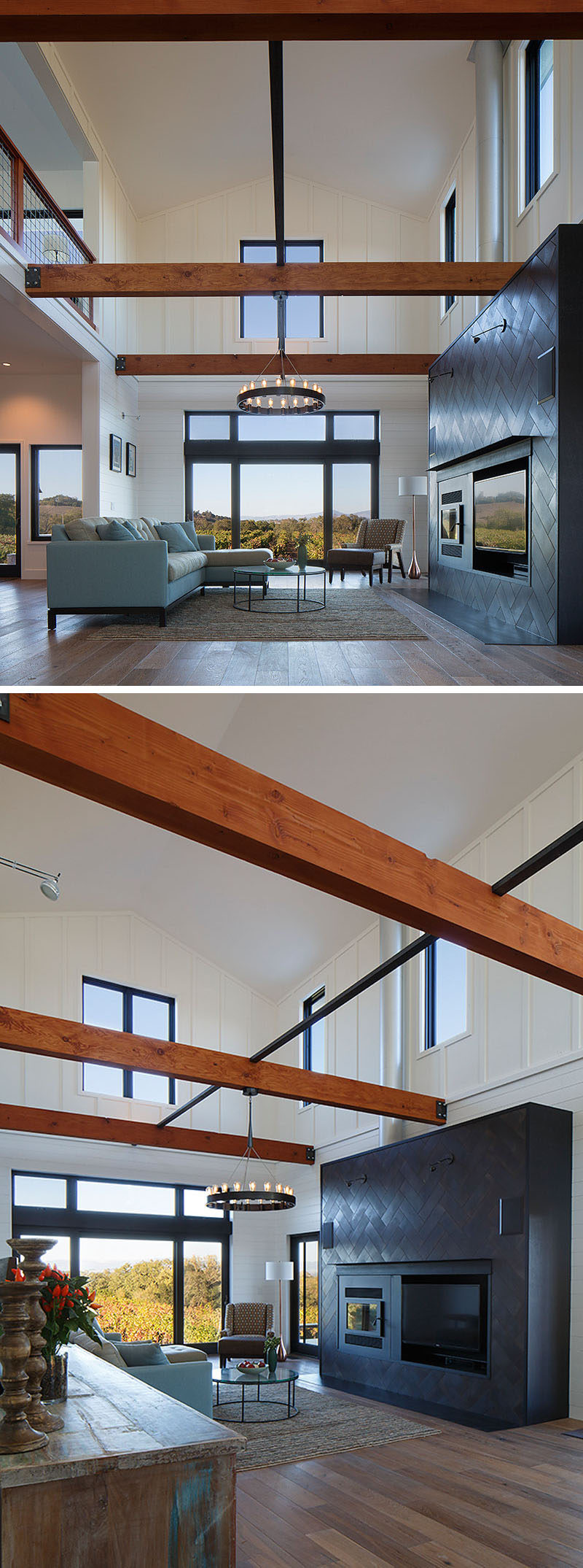 Stepping inside into this rustic modern living room, a picture window frames the view while a high ceiling makes the room feel grand and open. Rough-hewn wood beams add a rustic touch, while black tiles have been used as a fireplace and television surround. #LivingRoom #Fireplace #Windows