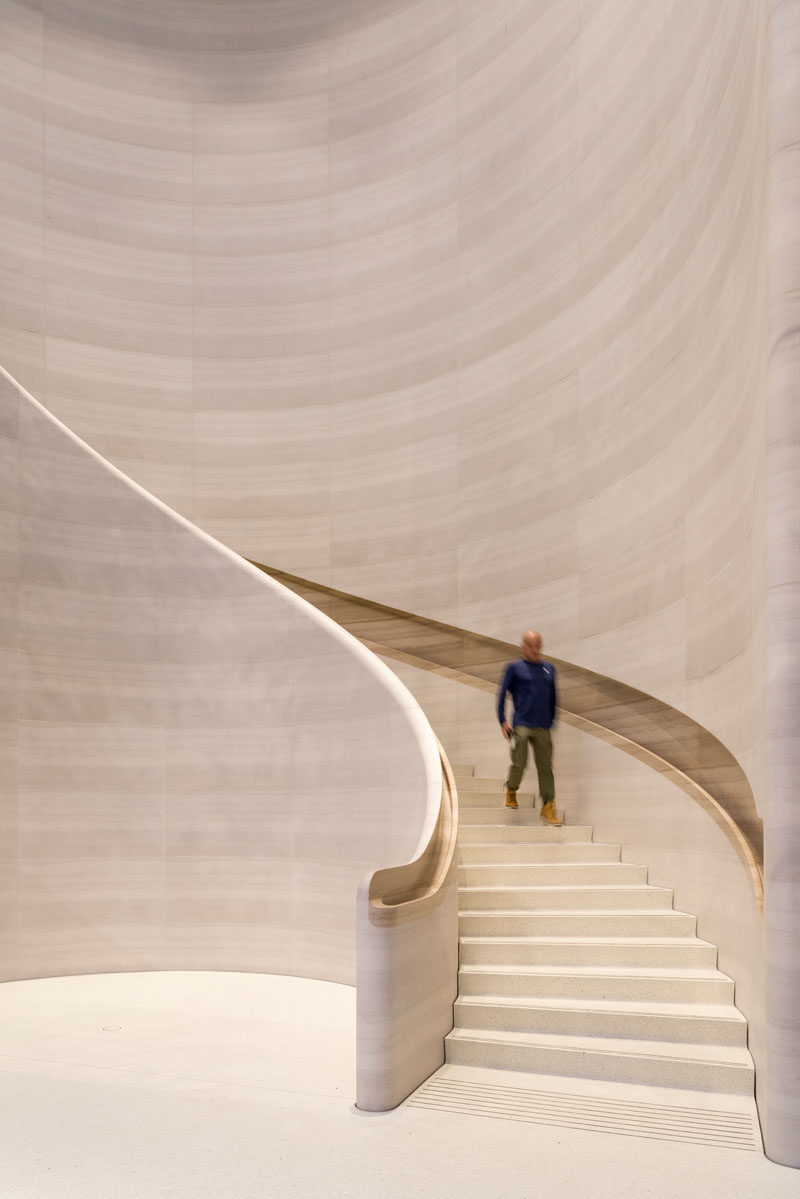 This Apple Store in Singapore features a hand-carved, curved stone staircase with built-in handrails. #Staircase #Stone