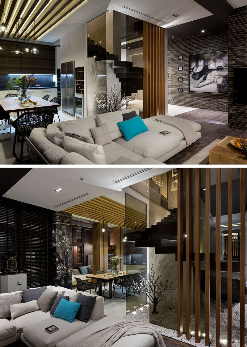 Materials Like Dark Brick, Wood, And Glass Are Used In The Interior ...