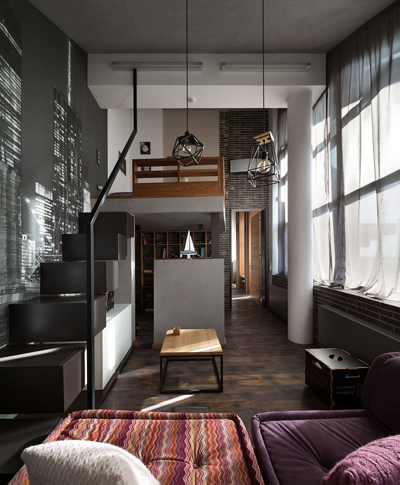 This modern bedroom has a small mezzanine that takes advantage of the high ceilings. #Mezzanine #ModernBedroom