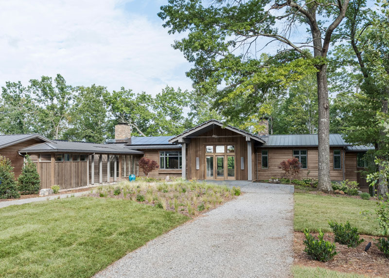 Samsel Architects have designed a modern farmhouse in Mill Spring, North Carolina, as a relaxing refuge for its owners. #ModernFarmhouse #Architecture