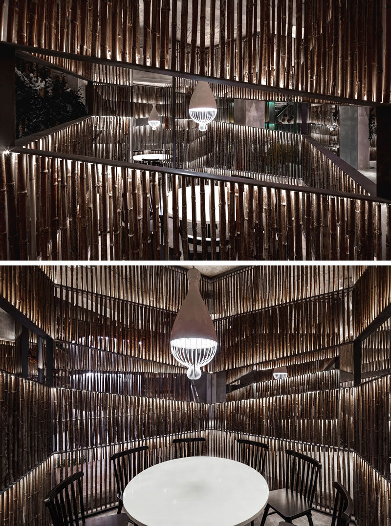 Bamboo has been heavily used throughout this modern restaurant. In the dining areas, bamboo is used to create private spaces for small groups. #ModernRestaurant #Bamboo #RestaurantDesign