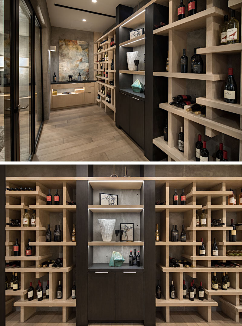 This modern wine cellar has open shelves that create plenty of space for the home owners to display their wine collection. #WineCellar #WineStorage