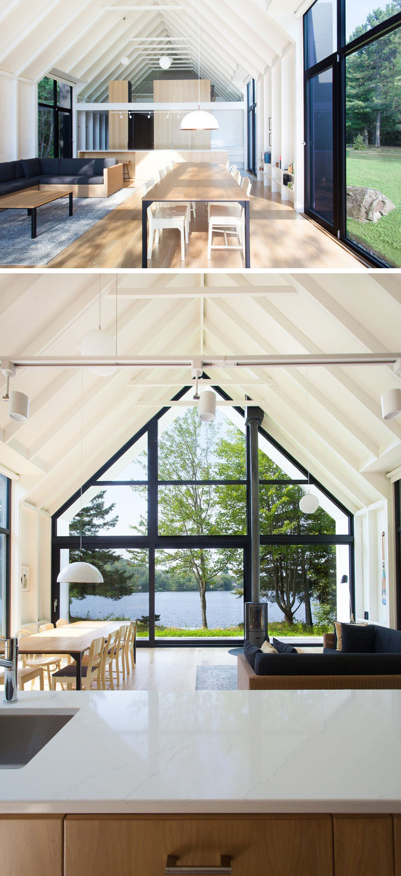 In the main living area of this modern vacation house, there's a kitchen, living area and dining area, that features a wall of glass that looks out to the lake and a large double-height gable extending outward to cover a small porch. #VacationHouse #Windows #InteriorDesign