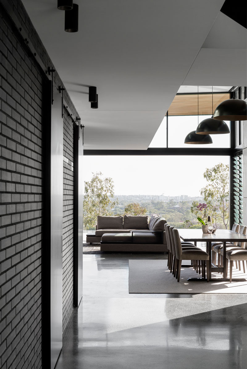 In this house, white walls and ceilings have been combined with dark brick to create a modern interior. #DarkBrick #ModernInterior