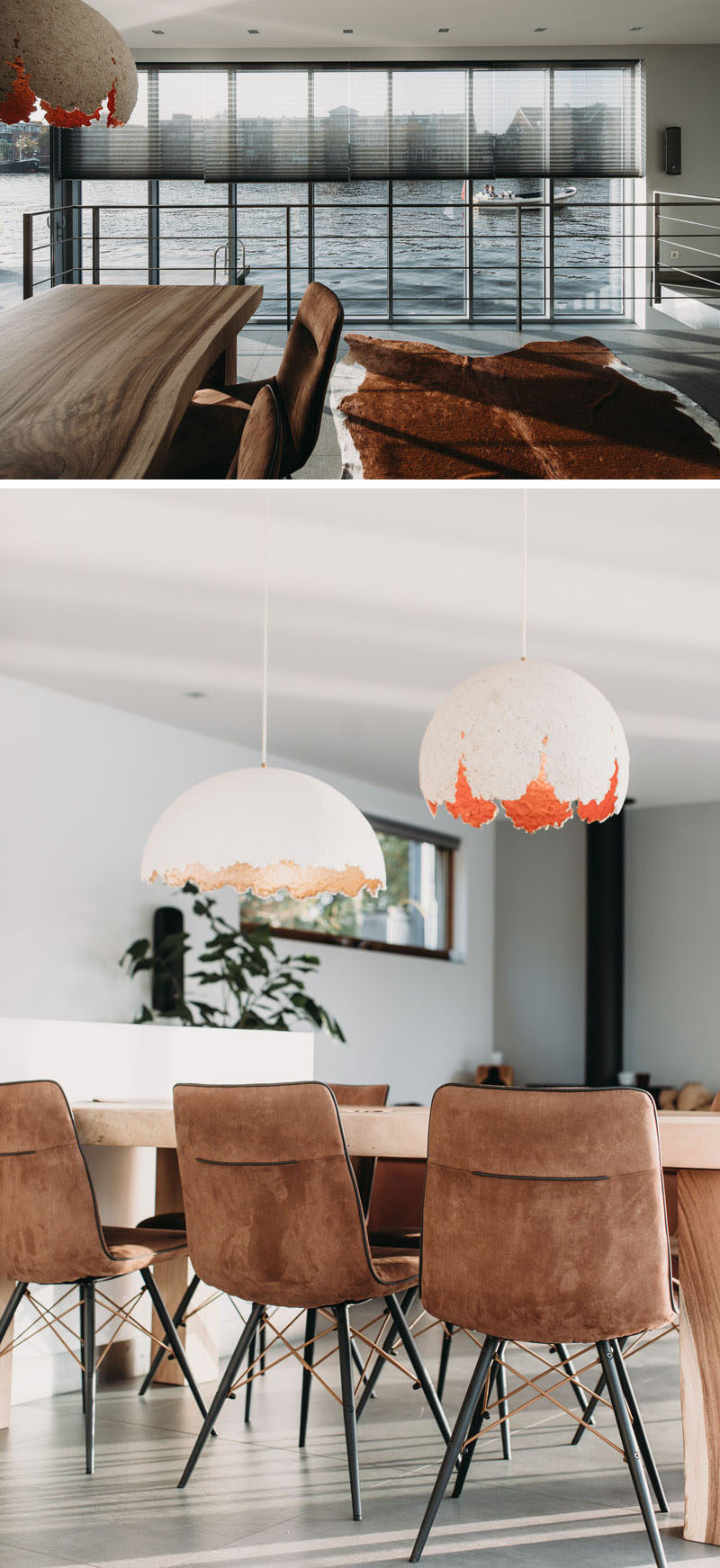 This modern houseboat has a wall of windows that provide views and allow natural light to filter through to the interior. In the dining area, a wood dining table sits below two sculptural pendant lights. #DiningRoom #Windows