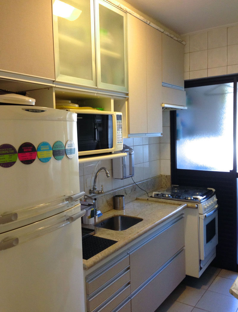 Flavio Castro of FC Studio has designed the bright and colorful renovation of a small kitchen in an apartment in Sao Paulo, Brazil. #BeforePhoto