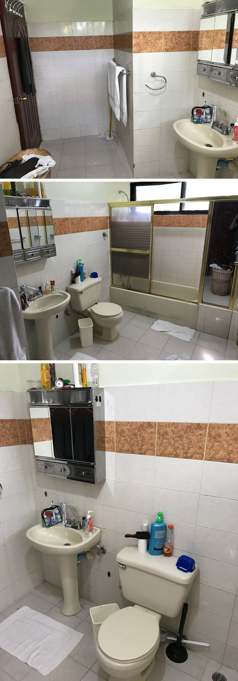 BEFORE PHOTOS - This 1990's bathroom was dated with white tiles, an band of brown-orange tiles, a pedestal sink, and a shower/bath combination with a metal shower door frame. #BeforePhotos #Renovation #Bathroom