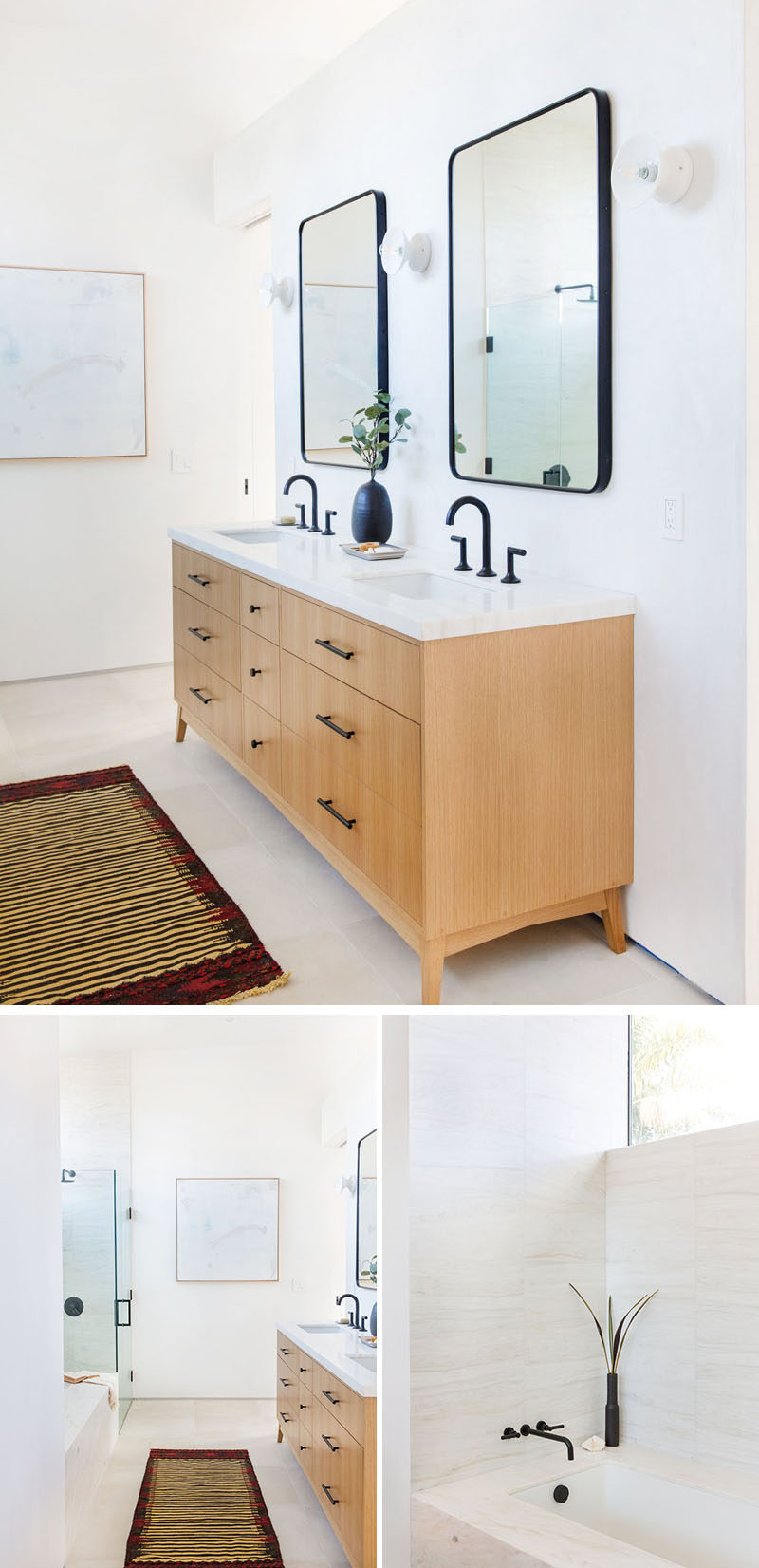 In this contemporary bathroom, a wood double-sink vanity sits opposite the shower with a glass surround and a built-in bathtub. Black framed mirrors break up the white walls. #Bathroom