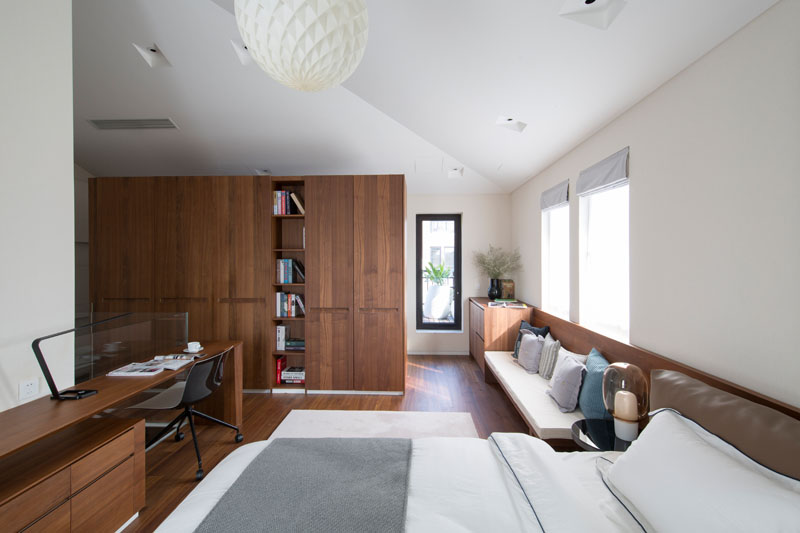 This Door Disguised As A Shallow Bookshelf Leads To A Secret Bedroom