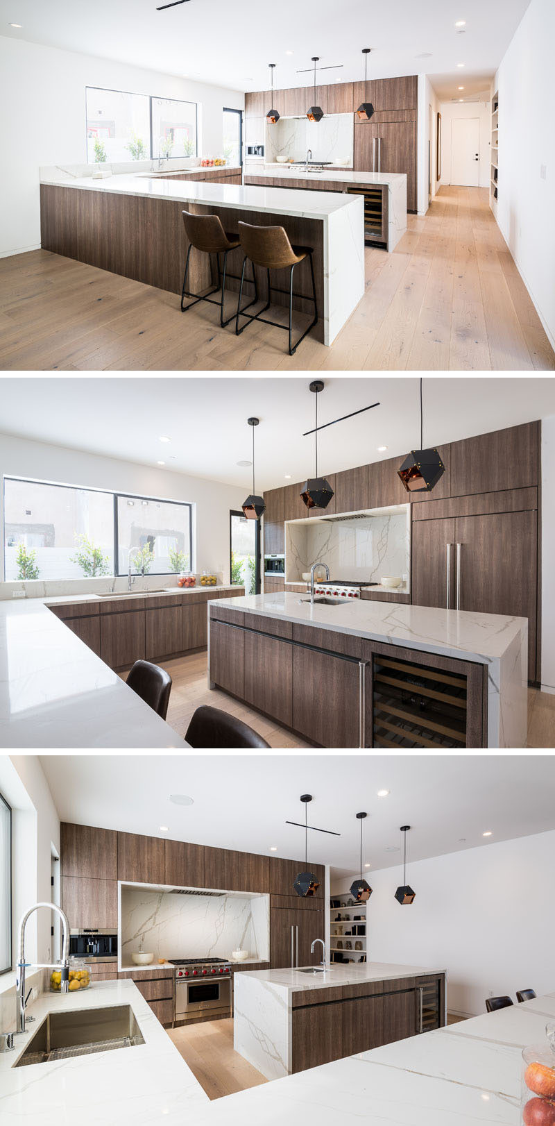 In this large kitchen, wood cabinetry has been paired with light countertops for a modern appearance. A central island with a secondary sink adds more counterspace to the large kitchen, and provides a place to have a wine fridge and additional storage.