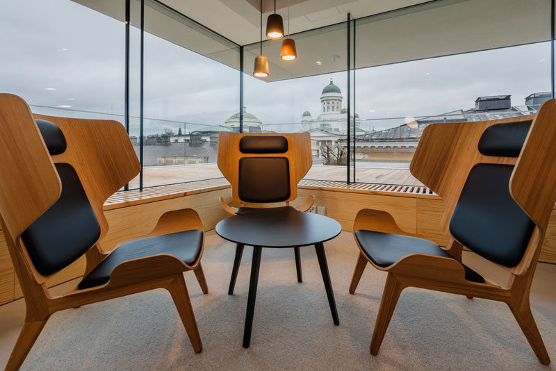 A three person meeting area has been created in this modern office in Helsinki. #Workplace #OfficeDesign