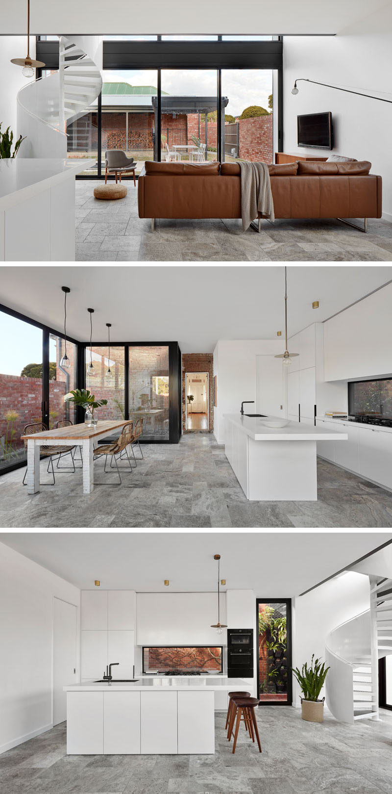 The bright white ground floor of this modern house extension has been designed as an open plan space with views of the backyard through the double height wall of windows. In the kitchen white cabinets have been paired with a Corian White Jasmine countertop. #LivingRoom #WhiteKitchen #ModernInterior