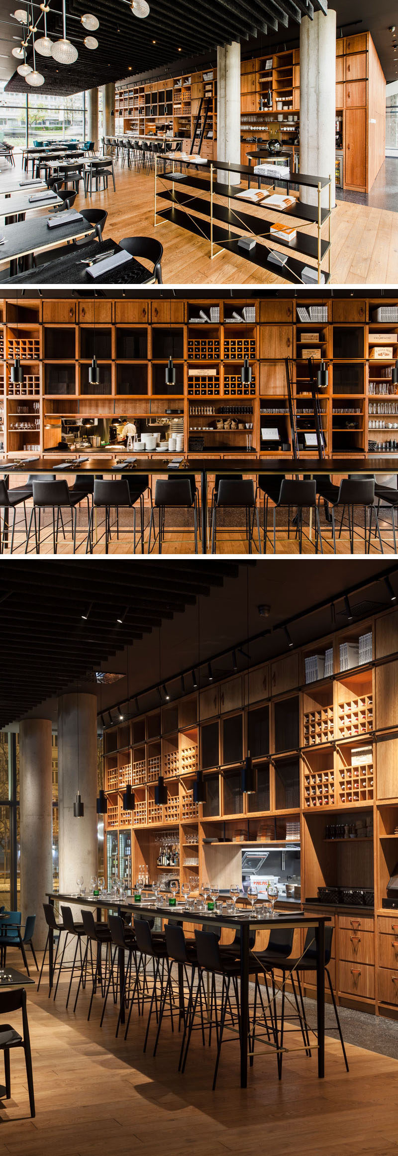 The dining room of this modern restaurant features a large floor-to-ceiling wood shelving unit that measures in at almost 14-meters-long. #RestaurantDesign #Shelving