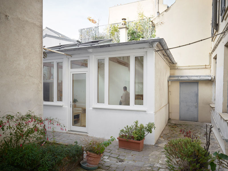 This small building that was once a garage and then an artist studio, has been transformed into a small house with a kitchen, bedroom, bathroom and lofted work area. #SmallHouse