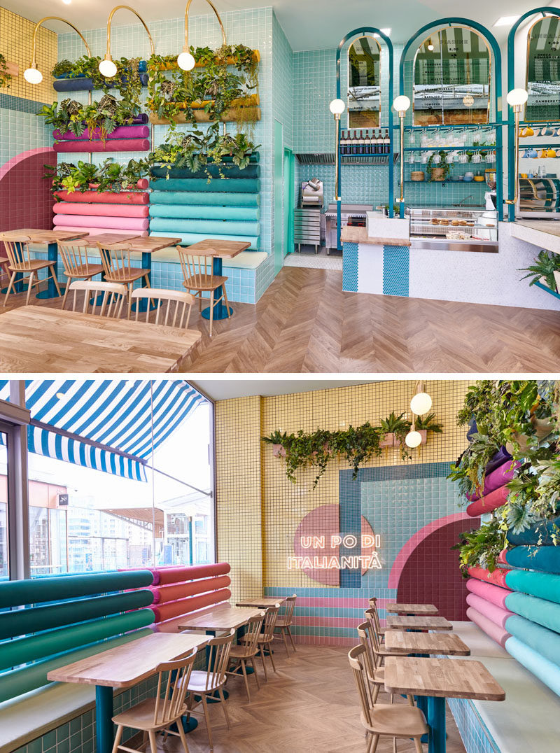 This modern restaurant features plants, wood, terracotta and bright colors. The neon light “A bit of Italy” was one of the key elements in the design. Click through to see more photos. #RestaurantDesign #RestaurantSeating #ModernRestaurant #InteriorDesign