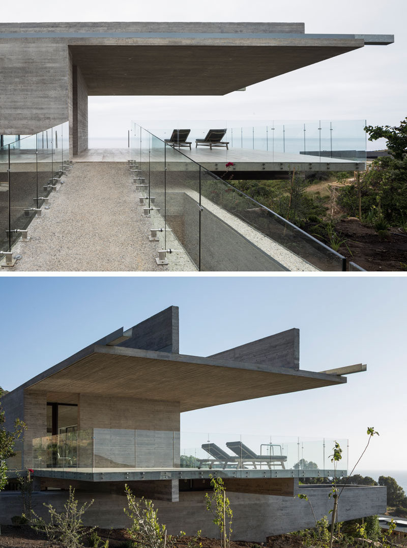 A small bridge leads to one end of this concrete house, and a covered area provides a place to enjoy the view in the shade. Click through to see more photos of this modern house. #ConcreteHouse #ModernHouse #Architecture