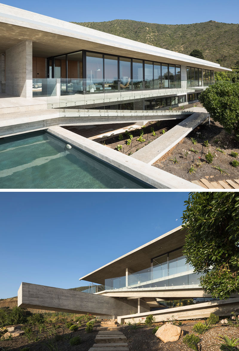 This modern concrete house has a cantilevered swimming pool and a sloped path that leads to the garden. Click through to see more photos of this house. #ConcreteHouse #ConcreteArchitecture #Path #SwimmingPool #Pool