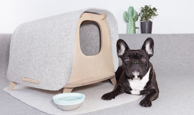The Wool Lodge is a modern multipurpose piece of pet furniture that can be used as a cat's litter box or as a cat and dog bed. It's made in France from plywood and merino wool. Click through to see more photos and more information. #DogFurniture #StylishDogBed #ModernDogBed