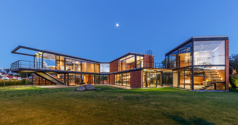 Architecture firm Estudio A0, have designed a brick, glass and steel house in Sangolquí, Ecuador, that has two pavilions, one for the client's own family and one for his parents. #ModernArchitecture #ModernHouse