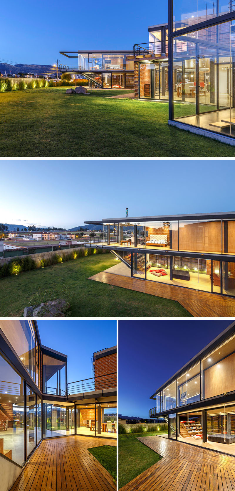 Walls of glass wrap around this modern house, while a wood deck follows the shape of the house. #GlassWalls #ModernArchitecture #Landscaping